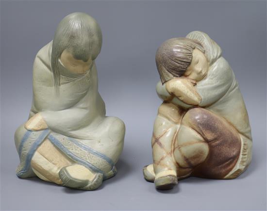 A Lladro boy and girl sleeping children